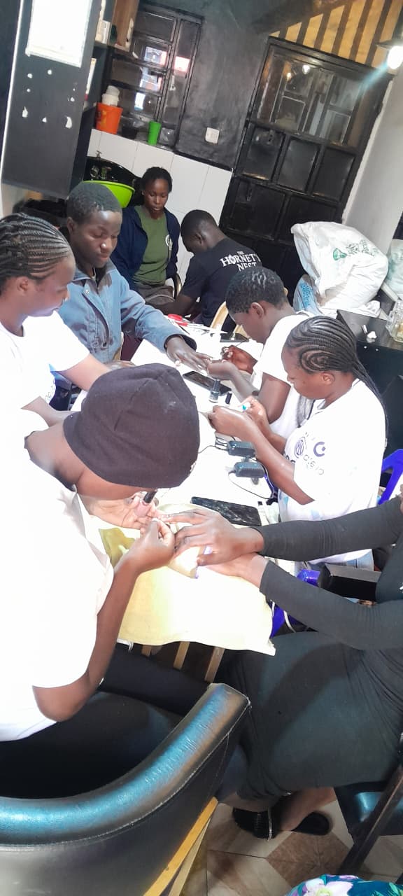 Trainee practising nail technology